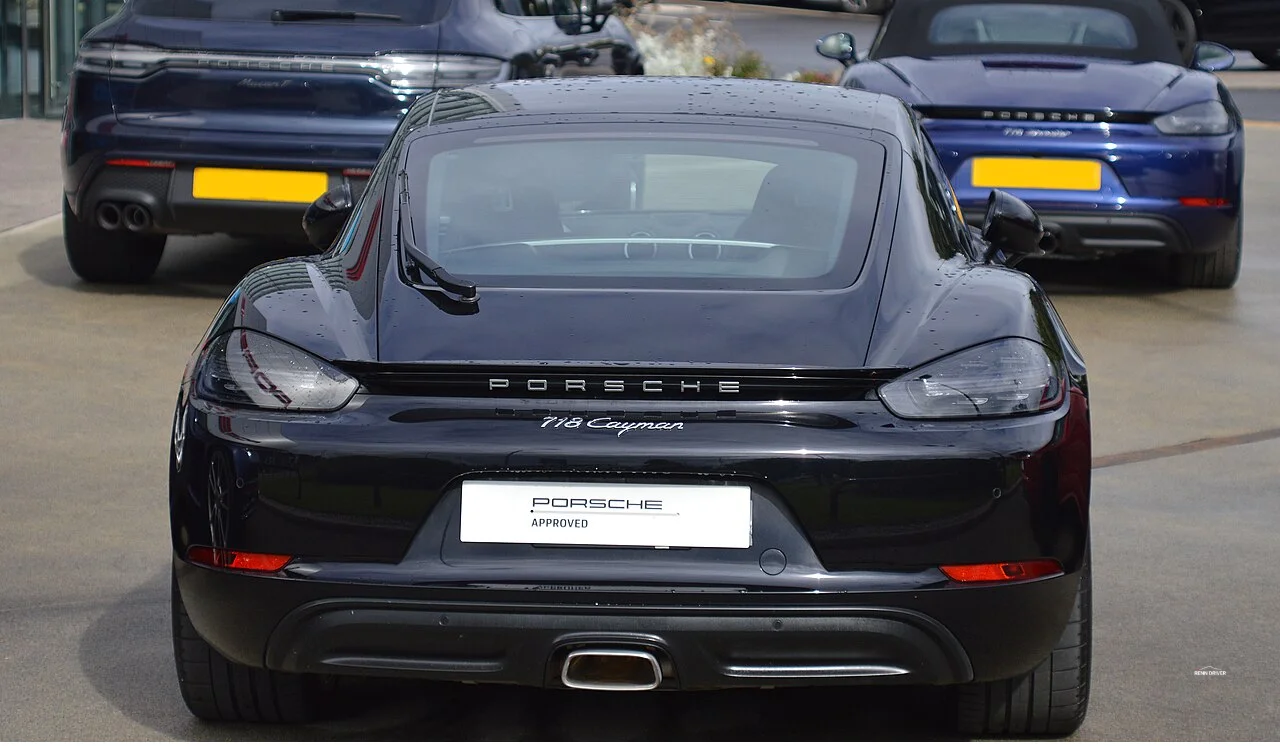 White Porsche 718 Cayman parked on the street