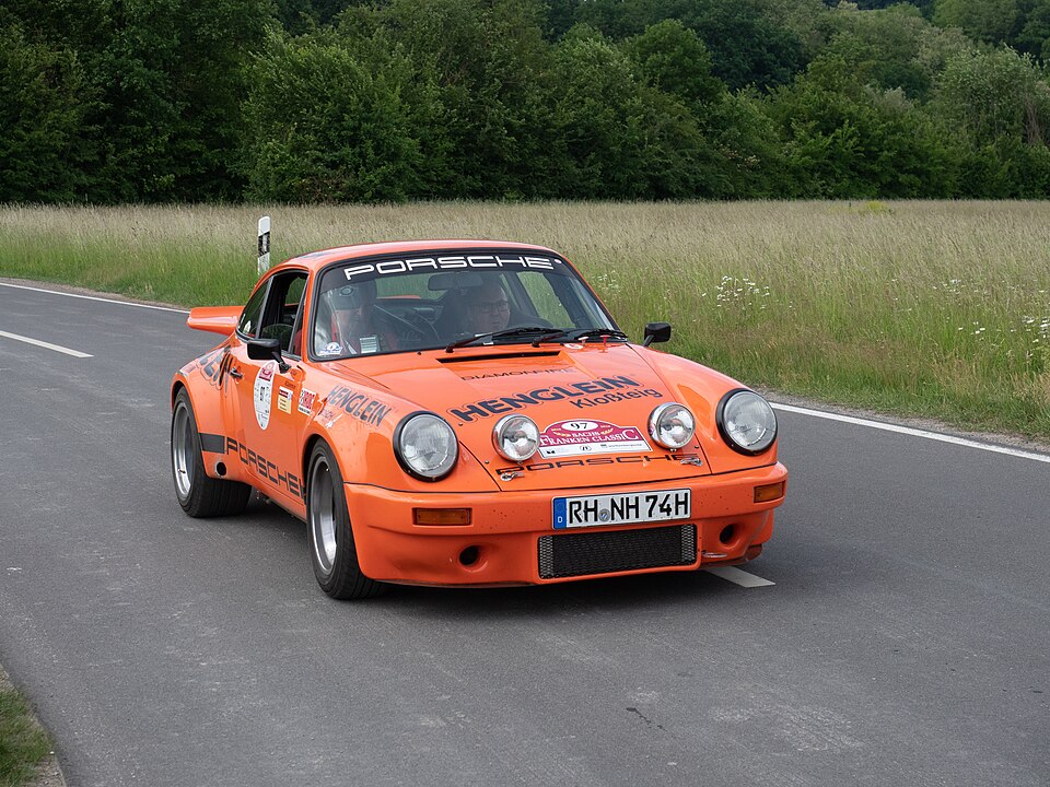 Porsche 911 RSR race car on circuit