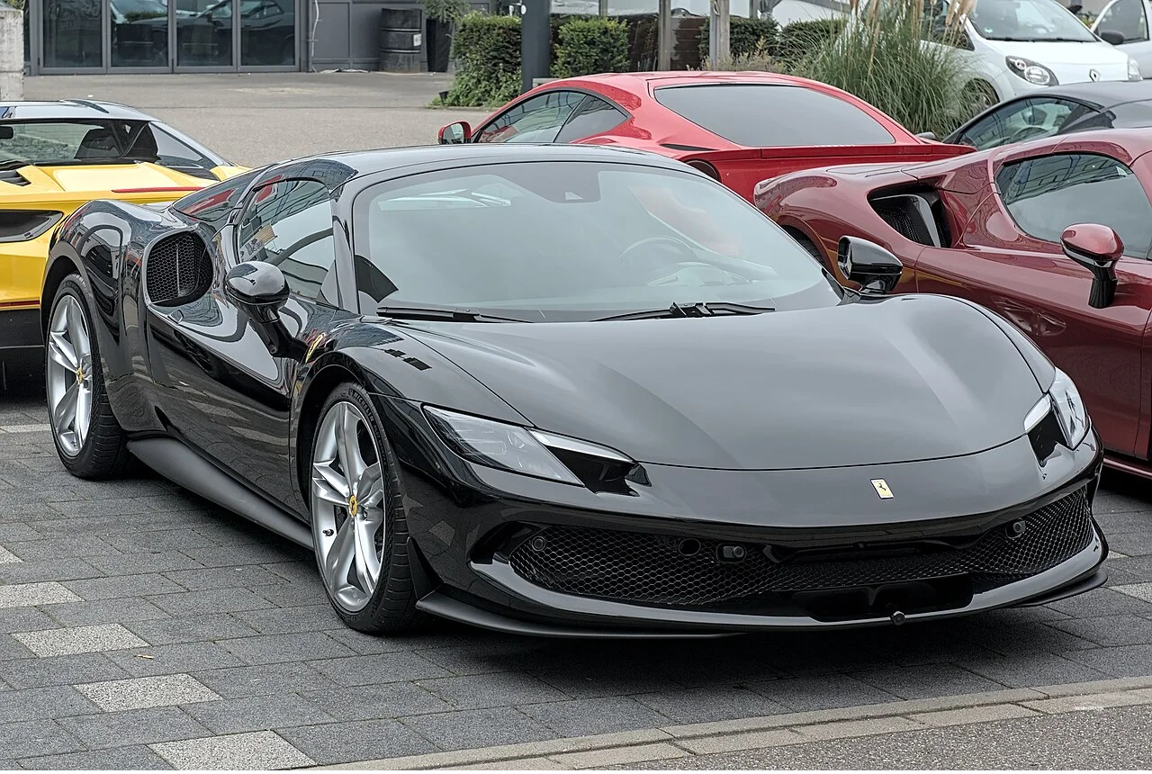 Black Ferrari 296 GTB front three quarter view