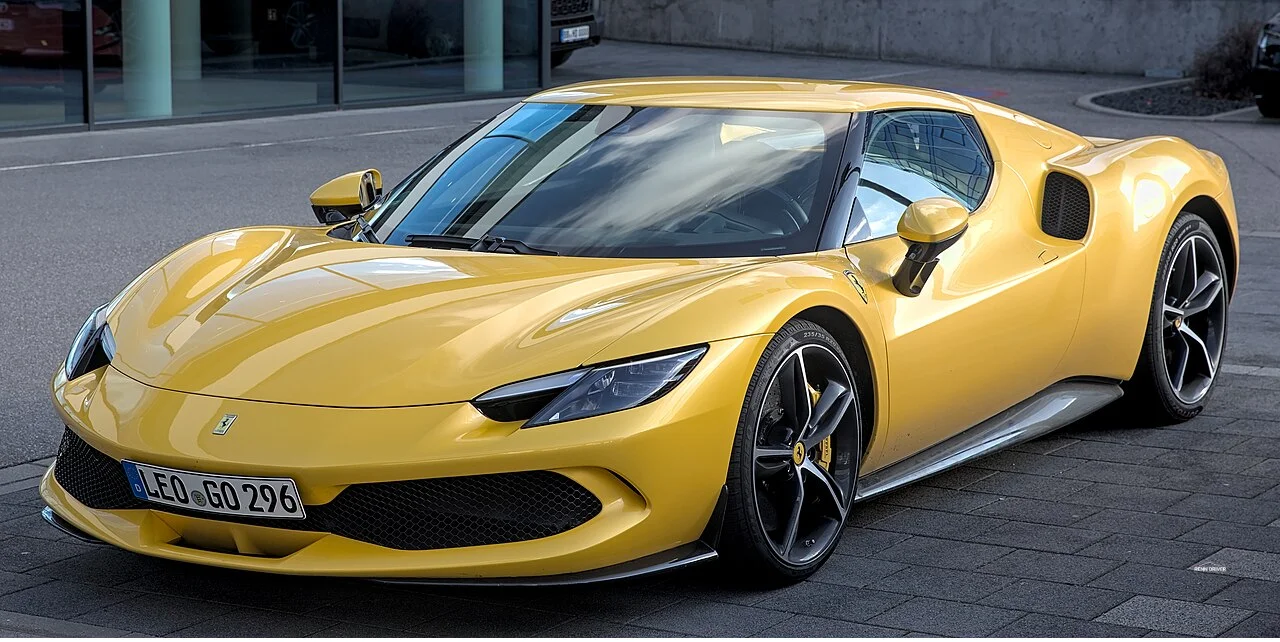 Yellow Ferrari 296 GTB front three quarter view