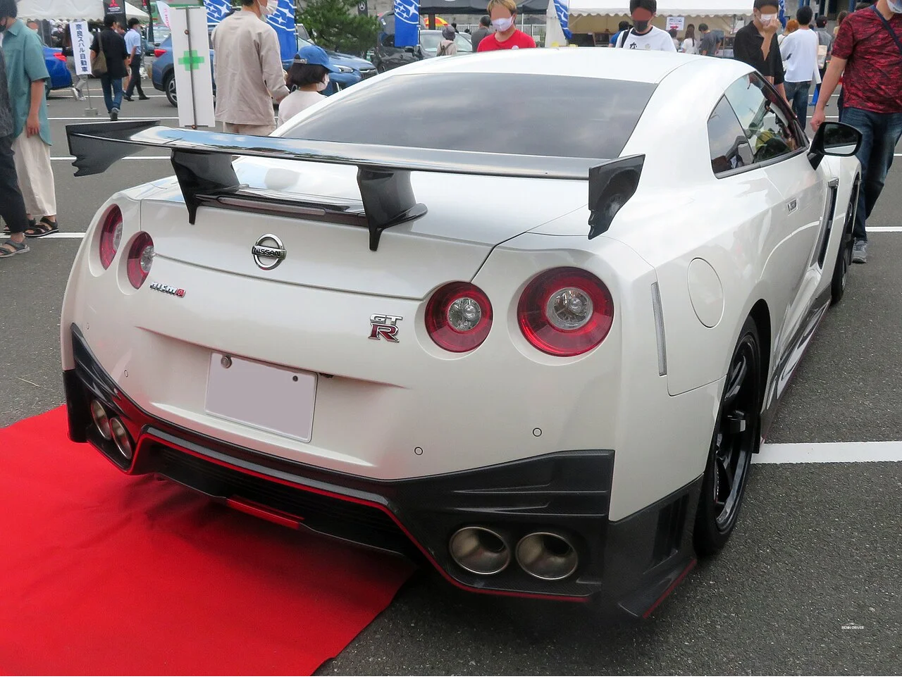 White Nissan GT-R NISMO R35 rear three-quarter view