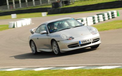 Silver Porsche 996 on the track