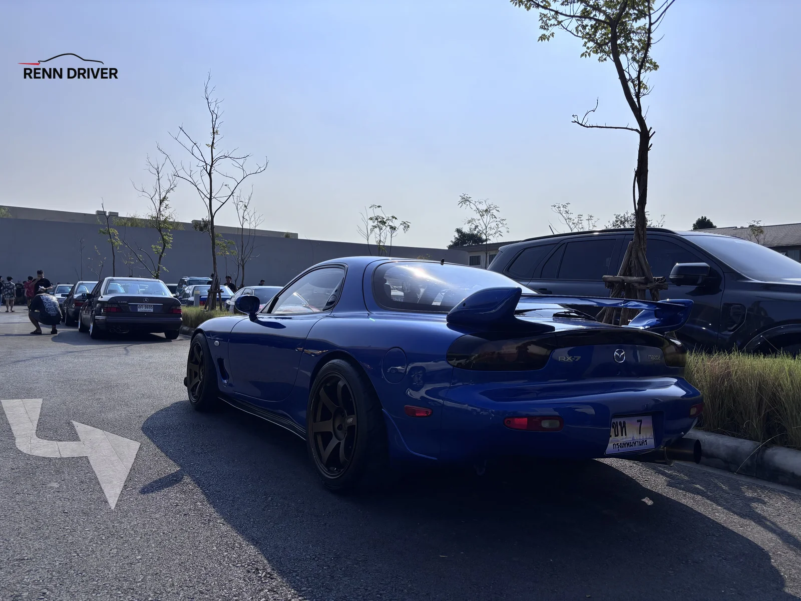 Blue Mazda RX-7 FD with rear wing
