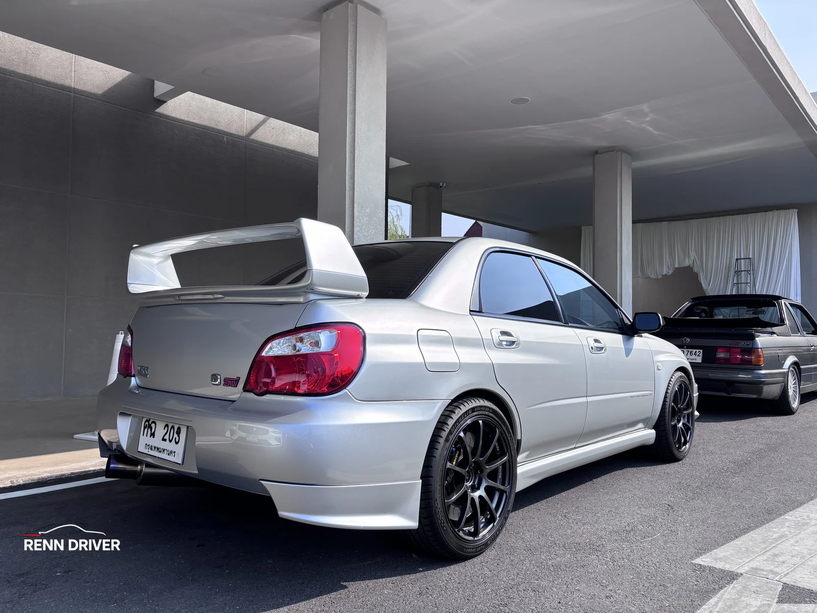 Silver Subaru WRX STI rear view