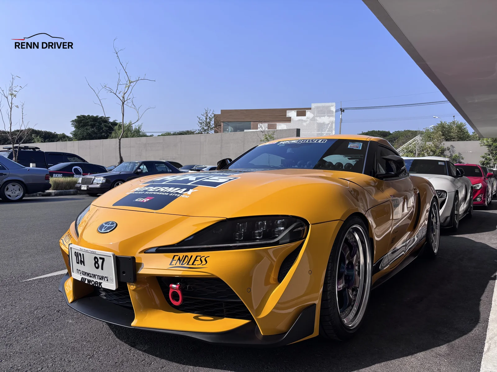 Yellow widebody Toyota Supra A90 with Endless brakes