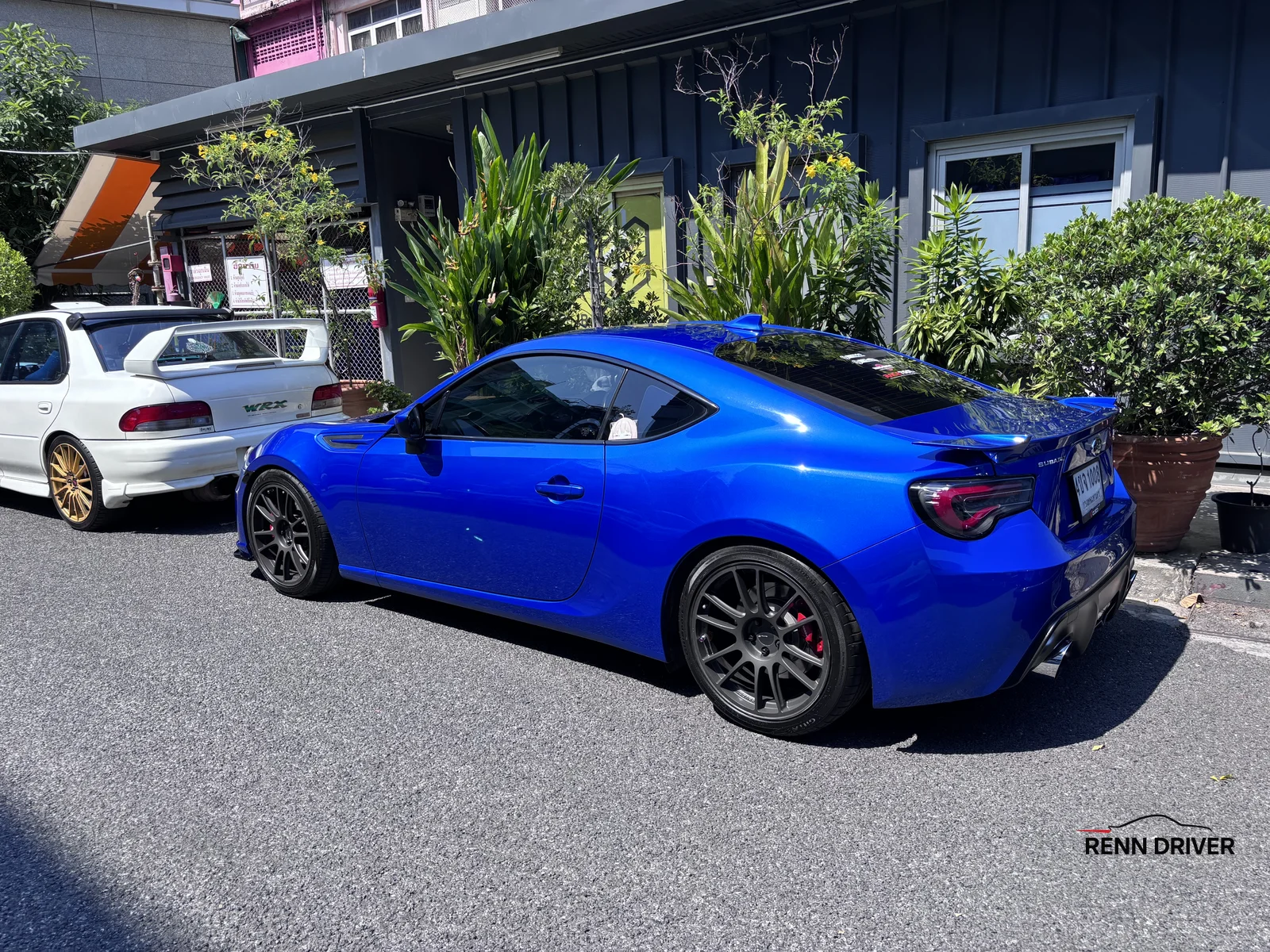 Blue Toyota 86 with gold wheels