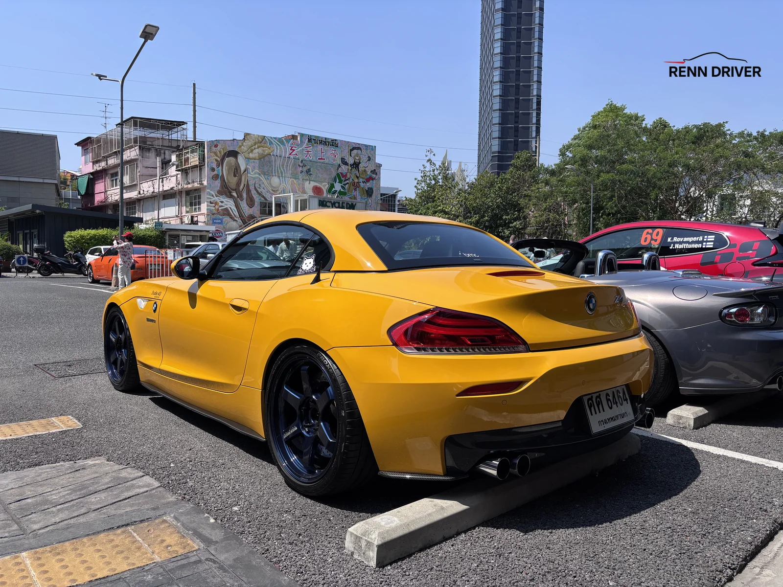 Yellow BMW Z4 rear three-quarter view