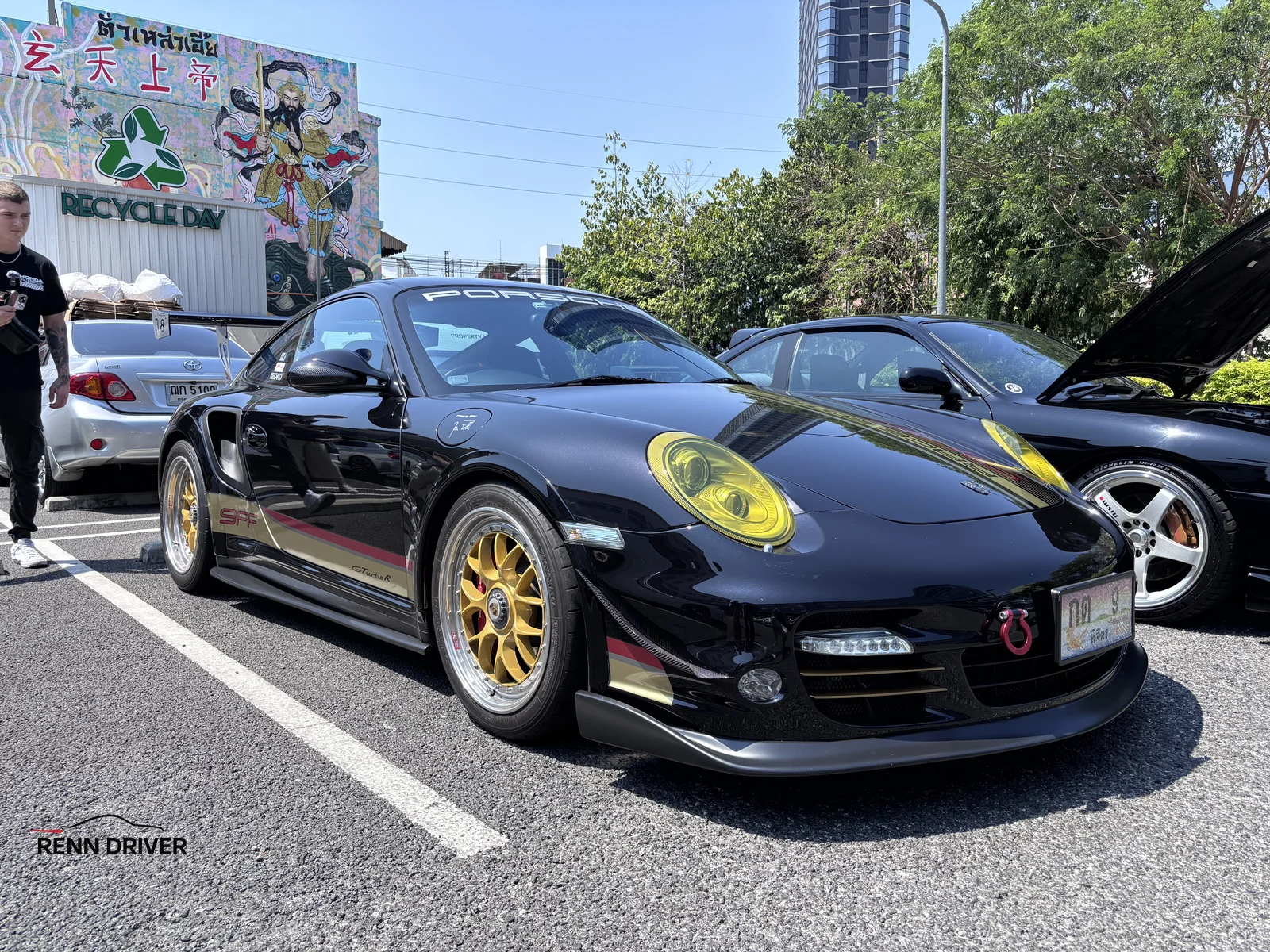 Black Porsche 997 Turbo front three-quarter