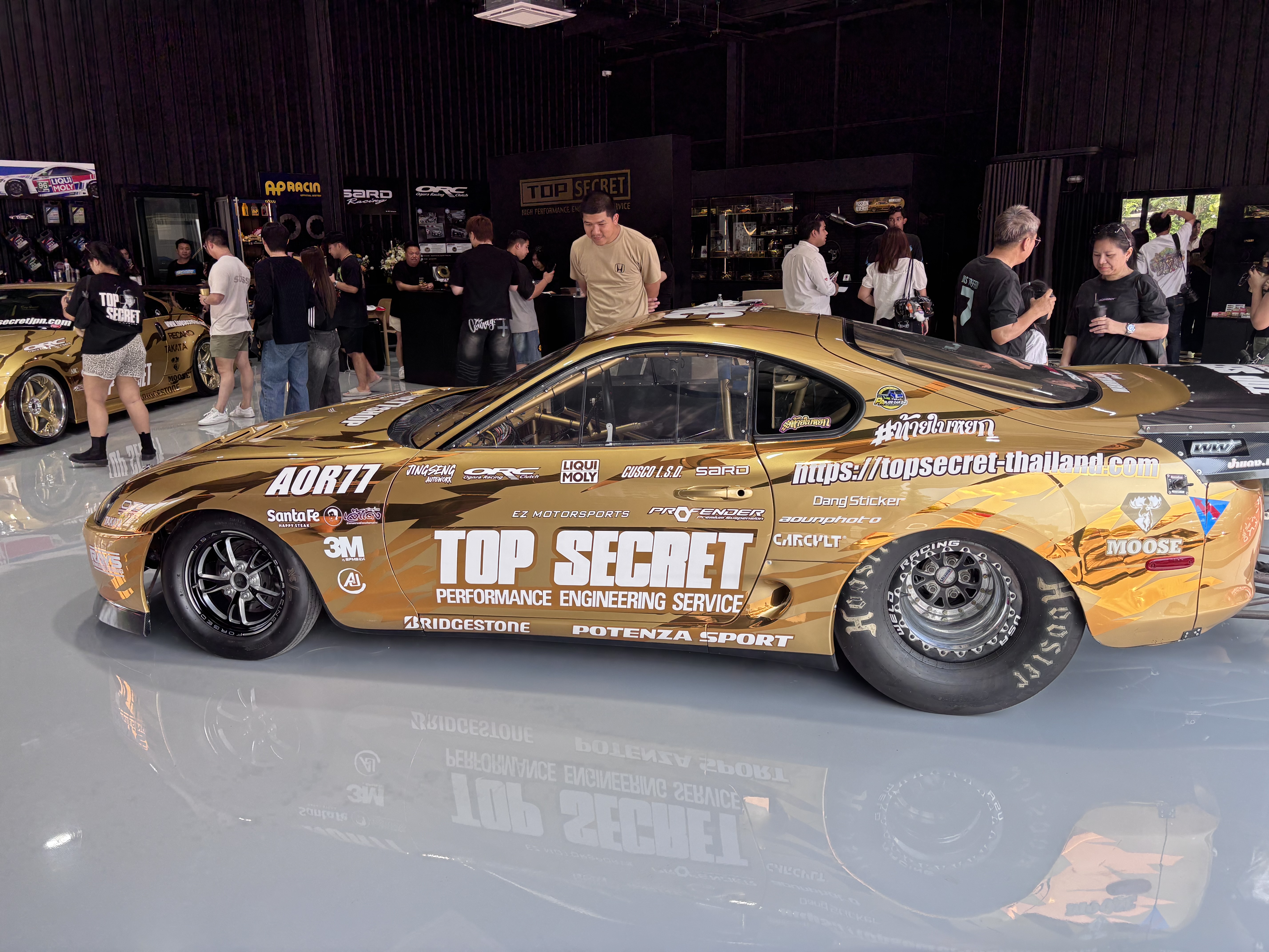 Gold Top Secret S15 Silvia race car in the showroom