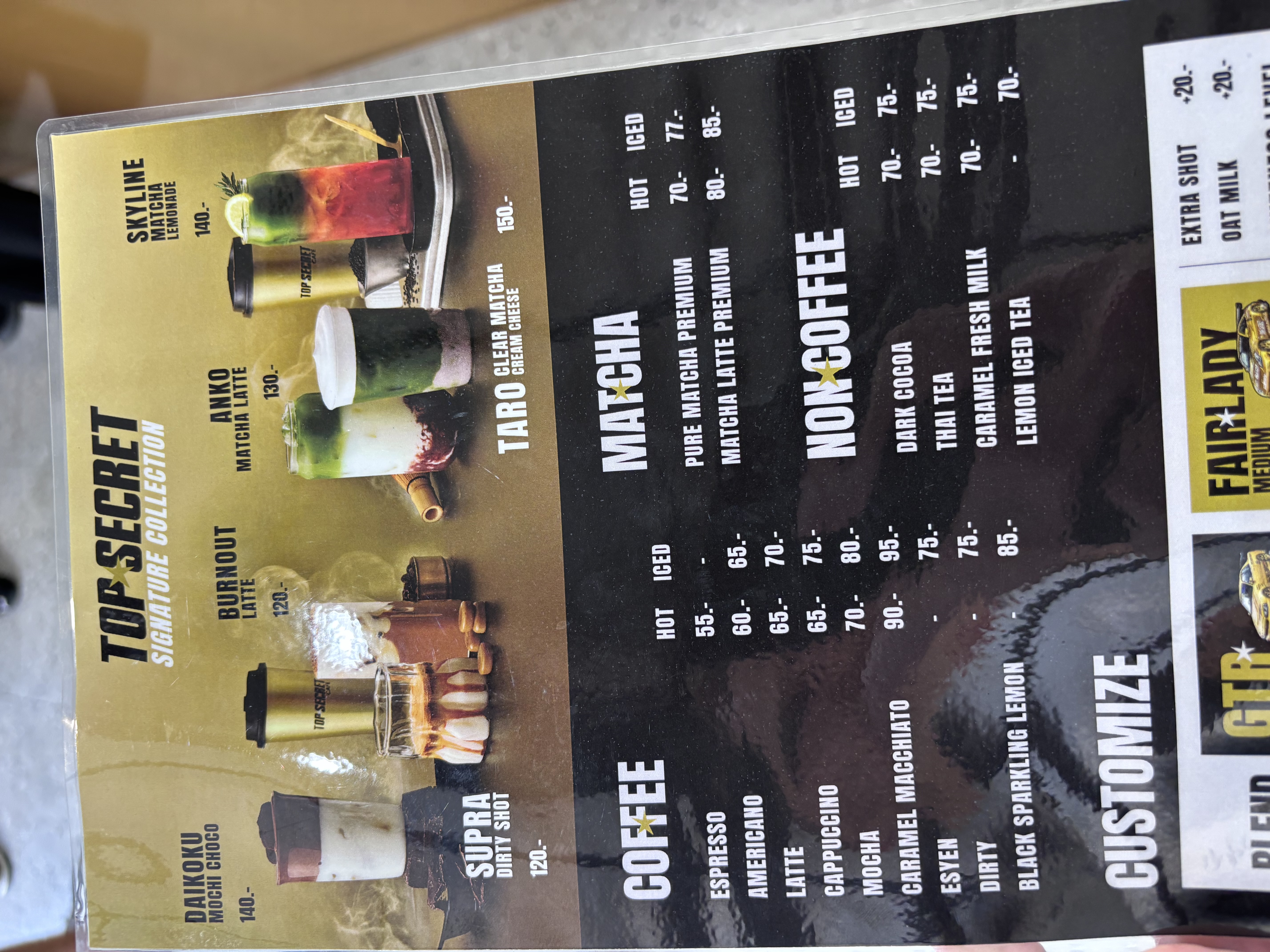 Top Secret Cafe drinks menu with Skyline, Daikoku, and Supra signature drinks